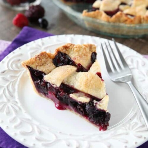 This Mixed Berry Pie uses a frozen blend of raspberries, blackberries, and blueberries which is perfect when fresh berries are out of season. No need to cook the filling ahead of time. Simply fill and bake. Enjoy this pie for the holidays or any day of the year!