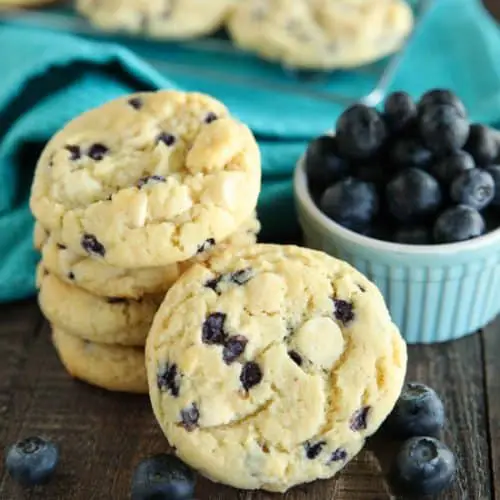 Blueberry Cheesecake Cookies are made with a muffin mix for a fruity, soft, and chewy cookie studded with creamy white chocolate chips. A quick and easy dessert!