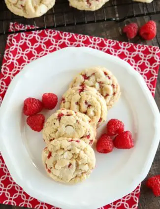 Raspberry Cheesecake Cookies are soft, chewy, and fruity! The best part is that they are made with a muffin mix which makes it a super easy dessert!