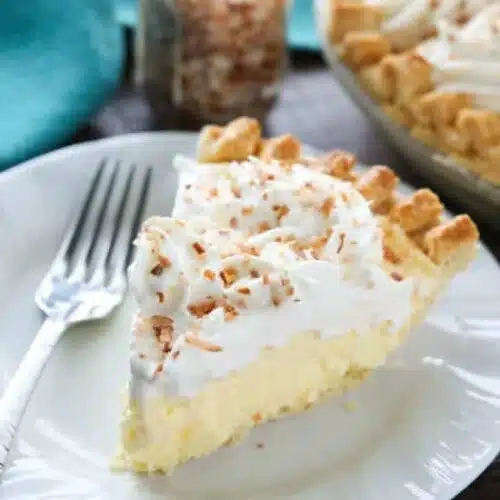 This Easy Coconut Cream Pie is light, delicious, and simple using instant coconut pudding, whipped cream, and toasted coconut.