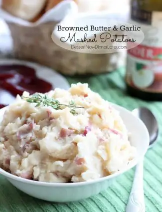 Browned butter and sautéed garlic give these mashed potatoes their rich and delicious flavor! From DessertNowDinnerLater.com