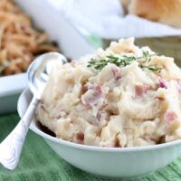 Browned butter and sautéed garlic give these mashed potatoes their rich and delicious flavor! From DessertNowDinnerLater.com