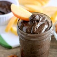 This Dark Chocolate Honey Almond Butter is made with pure ingredients for a healthy homemade spread great on toast, as a dip for apples and bananas, or eaten straight from the spoon! (Bonus! It's Gluten Free, Paleo, and can easily be turned into Vegan.)