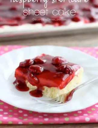 This EASY and delicious Raspberry Shortcake Sheet Cake is layered with light, fluffy white cake, topped with whipped cream cheese frosting and a fresh raspberry glaze! Perfect for parties, potlucks, or a Valentine's Day dessert!