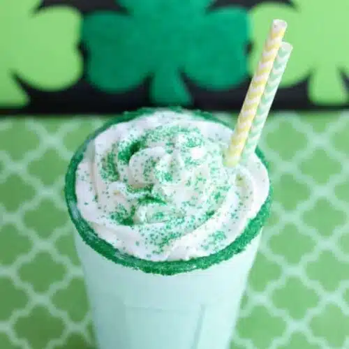 This Copycat McDonald's Shamrock Shake is minty, green, and topped with whipped cream! Perfect for St. Patrick's Day!