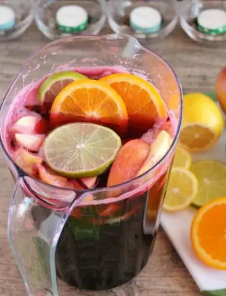 Easy Virgin Sangria - only 2 ingredients plus fresh cut fruit. A bubbly, fruity drink perfect for any party!