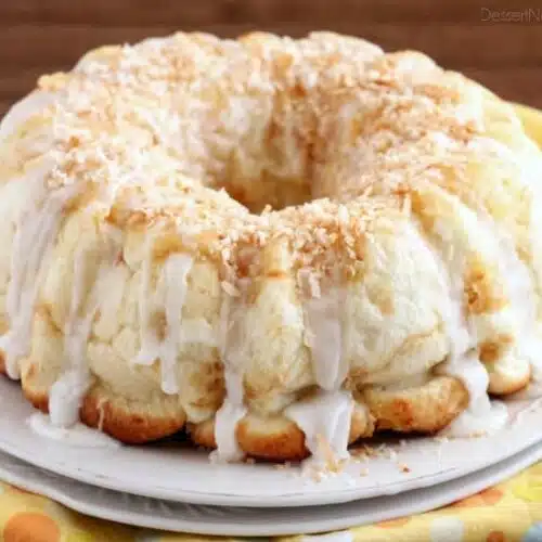 Pina Colada Monkey Bread - toasted coconut, crushed pineapple, and a secret ingredient combine together to make this sticky pull apart bread a tropical treat!