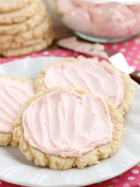 The ingredients list might surprise you with these scoop, press, and bake rustic-looking sugar cookies. With a soft, sweet, melt-in-your-mouth cookie base, topped with a smooth and dreamy buttercream frosting -- these really are the BEST sugar cookies you will make at home!