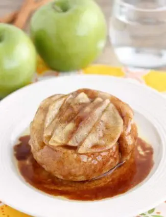 This single serving Upside-Down Apple Cinnamon Roll cooks in 2 minutes in the microwave! The perfect fall dessert for one!