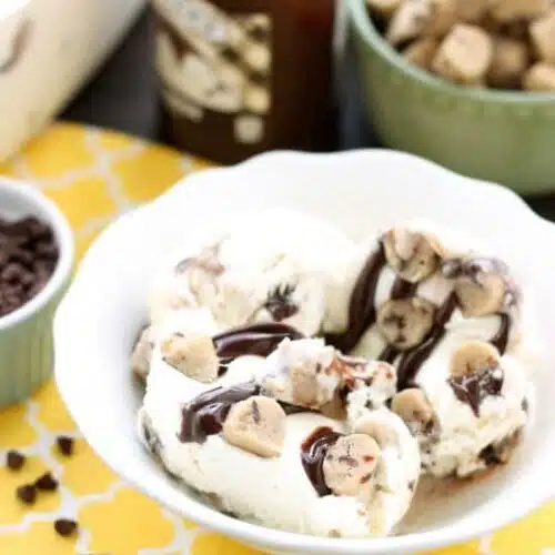 This no churn chocolate chip cookie dough ice cream has generous pieces of eggless cookie dough inside a creamy vanilla ice cream with hot fudge swirls. No ice cream machine needed to make this delicious dessert!