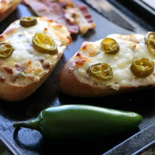 Jalapeno Popper Bread can double as a delicious appetizer or easy pizza dinner with bacon, cream cheese, and jalapeno slices for maximum flavor!