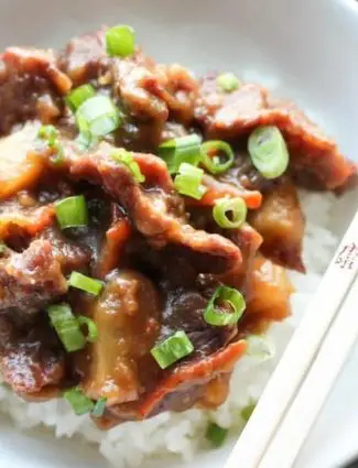 This Slow Cooker Mongolian Beef & Pineapple is a little spicy, a little sweet, full of authentic Asian flavors, and is so easy to make!