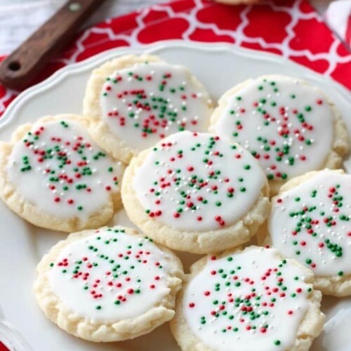 Meltaway cookies are a soft, lightly sweet shortbread cookie that literally melts away in your mouth. Top it with a thin glaze and red and green sprinkles for a festive Christmas cookie treat.