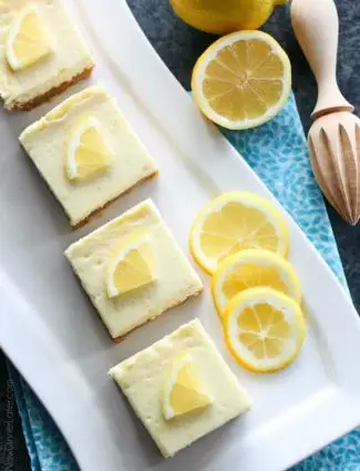 Lemon Cheesecake Bars are creamy and lightly sweet with a bright and tangy lemon flavor throughout for a wonderful spring time dessert.