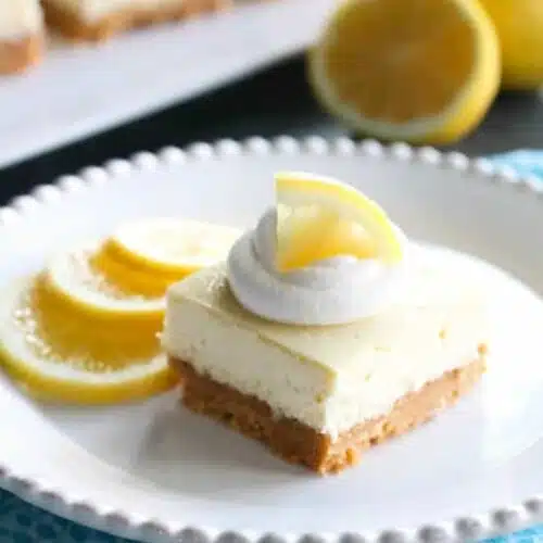 Lemon Cheesecake Bars are creamy and lightly sweet with a bright and tangy lemon flavor throughout for a wonderful spring time dessert.