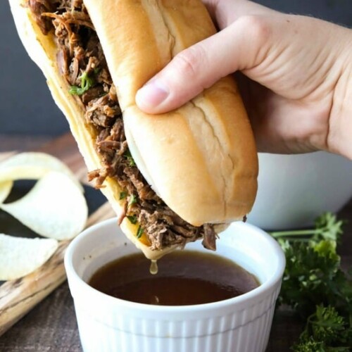 Instant Pot French Dip Sandwiches are full of fork-tender beef roast cooked in a flavorful broth that makes the perfect au jus dipping sauce. A family favorite, easy pressure cooker dinner!