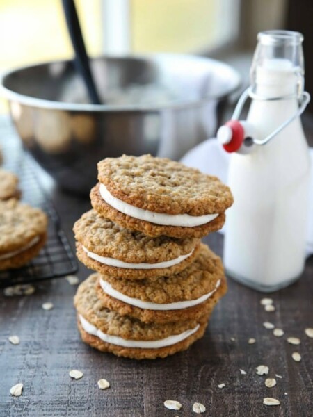 Oatmeal Cream Pies - Soft and chewy oatmeal cookies filled with vanilla buttercream frosting. Inspired by Little Debbie, but made fresh and delicious in your own home!