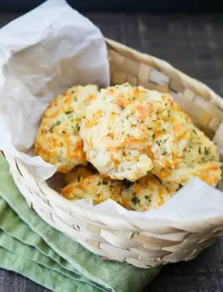 This copycat Red Lobster Cheddar Bay Biscuits recipe is super delicious! Crisp edges, a fluffy biscuit center, with plenty of cheese, garlic, and extra butter slathered on top. You won't be able to eat just one!