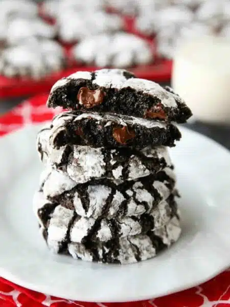 Chocolate Crinkle Cookies are soft and fudgy on their own, but these have chocolate chips added for twice the chocolatey goodness! Enjoy these Double Chocolate Crinkle Cookies for Christmas or any time of year!