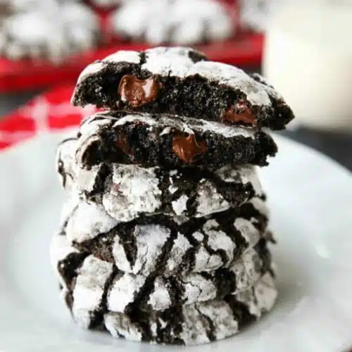 Chocolate Crinkle Cookies are soft and fudgy on their own, but these have chocolate chips added for twice the chocolatey goodness! Enjoy these Double Chocolate Crinkle Cookies for Christmas or any time of year!