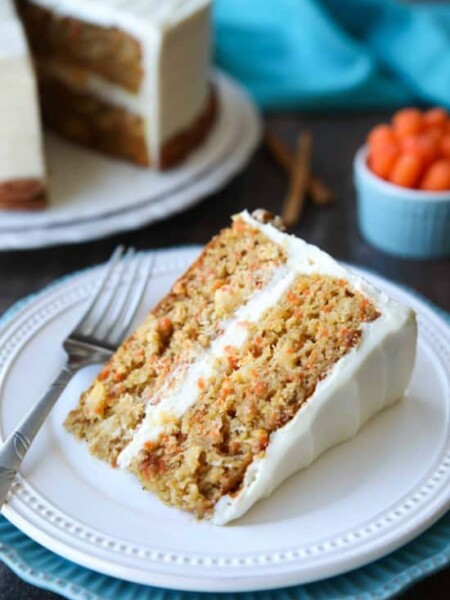 This easy carrot cake recipe is moist, perfectly-spiced, and topped with the BEST cream cheese frosting. Customize it with your favorite fillers or enjoy it simply as is.