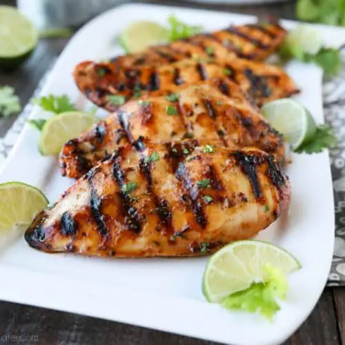 This Chipotle Chicken is marinated in a bold, sweet and spicy mixture with tasty herbs and spices, creating juicy, flavorful grilled chicken. Our absolute favorite chicken marinade!