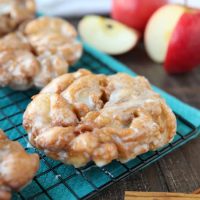 Apple Fritters - an easy and delicious yeast doughnut with chunks of apples, ground cinnamon, and a sweet glaze.