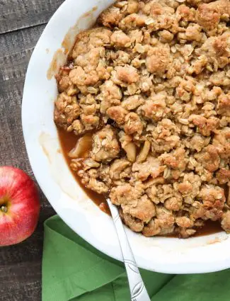 This is the best Apple Crisp recipe! It's full of fresh sliced apples, creates a fruity cinnamon-sugar sauce while it bakes (like apple pie filling), and is topped with a crunchy crumb topping. An easy, old fashioned fall dessert.