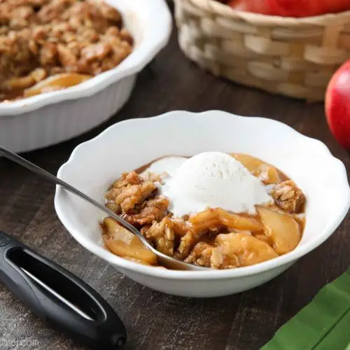 This is the best Apple Crisp recipe! It's full of fresh sliced apples, creates a fruity cinnamon-sugar sauce while it bakes (like apple pie filling), and is topped with a crunchy crumb topping. An easy, old fashioned fall dessert.