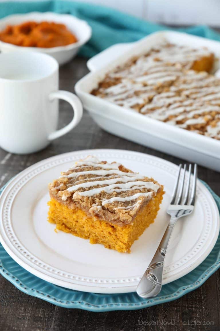 Pumpkin Spice Coffee Cake is easy to make and full of real pumpkin and fragrant spices. It's moist, yet light and fluffy, with a cinnamon crumb topping and pumpkin spice icing drizzled on top.