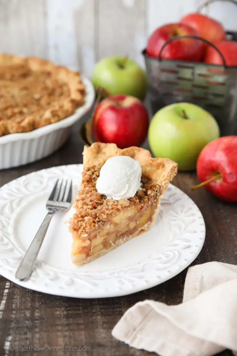 Dutch Apple Pie is made in a traditional pie crust, that's loaded with fresh cinnamon glazed apples, and topped with a sweet, buttery crumb streusel. It's like a combination of classic apple pie and apple crisp. A delicious holiday dessert.