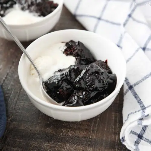 Hot Fudge Pudding Cake is easy to make and magically bakes chocolate cake with a hot fudge pudding sauce in the same pan. It's gooey, chocolatey, and delicious! Serve it warm with ice cream for an even tastier dessert!