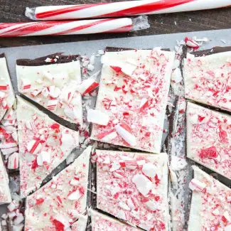 Peppermint Bark is a favorite Christmas treat that's super easy to make with only four ingredients: semi-sweet chocolate, white chocolate, peppermint extract, and candy canes.