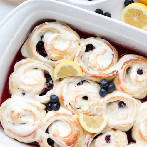 Lemon Blueberry Sweet Rolls are made easy with store-bought bread dough, a sticky lemon filling, fresh blueberries, and a tangy lemon cream cheese frosting.