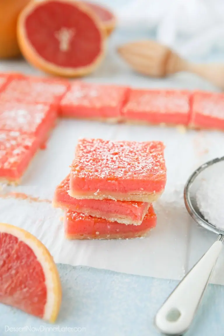 Grapefruit Bars are just like your favorite lemon bars with a shortbread crust and citrus curd, but with the sweeter flavor of pink grapefruit.