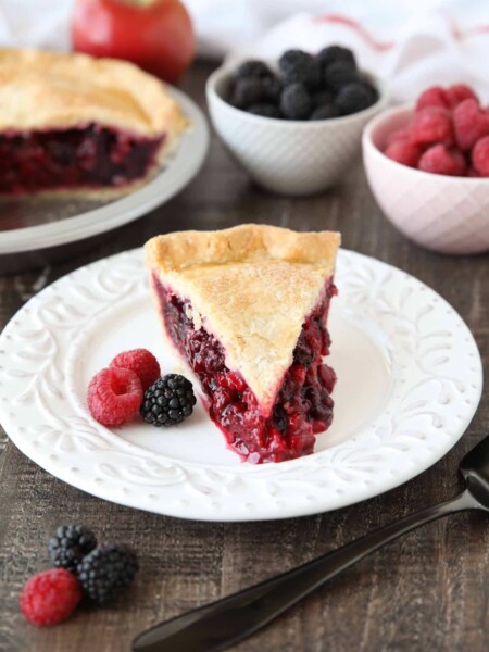 Slice of Razzleberry Pie on a plate. Focusing on the berry pie filling.