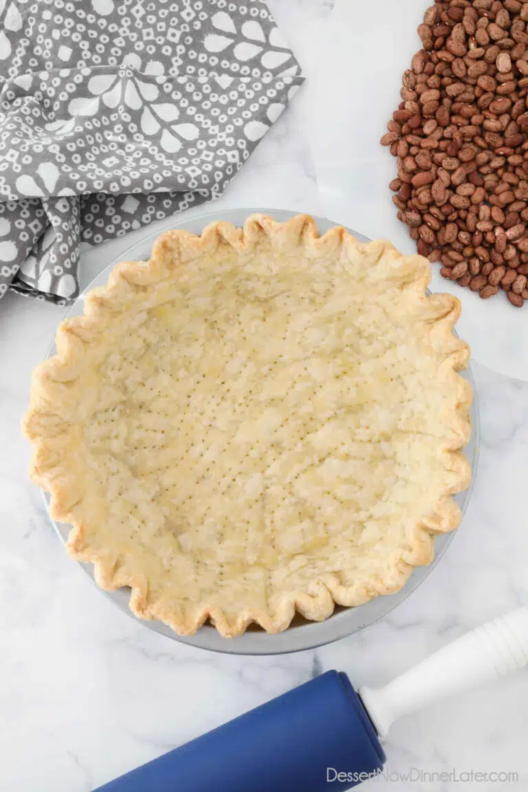 Blind baked pie crust in pan ready for filling.