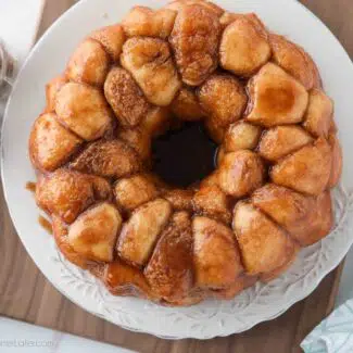 Top view of sticky warm monkey bread on a plate.