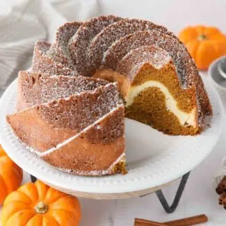 Inside of pumpkin bundt cake with cream cheese filling.