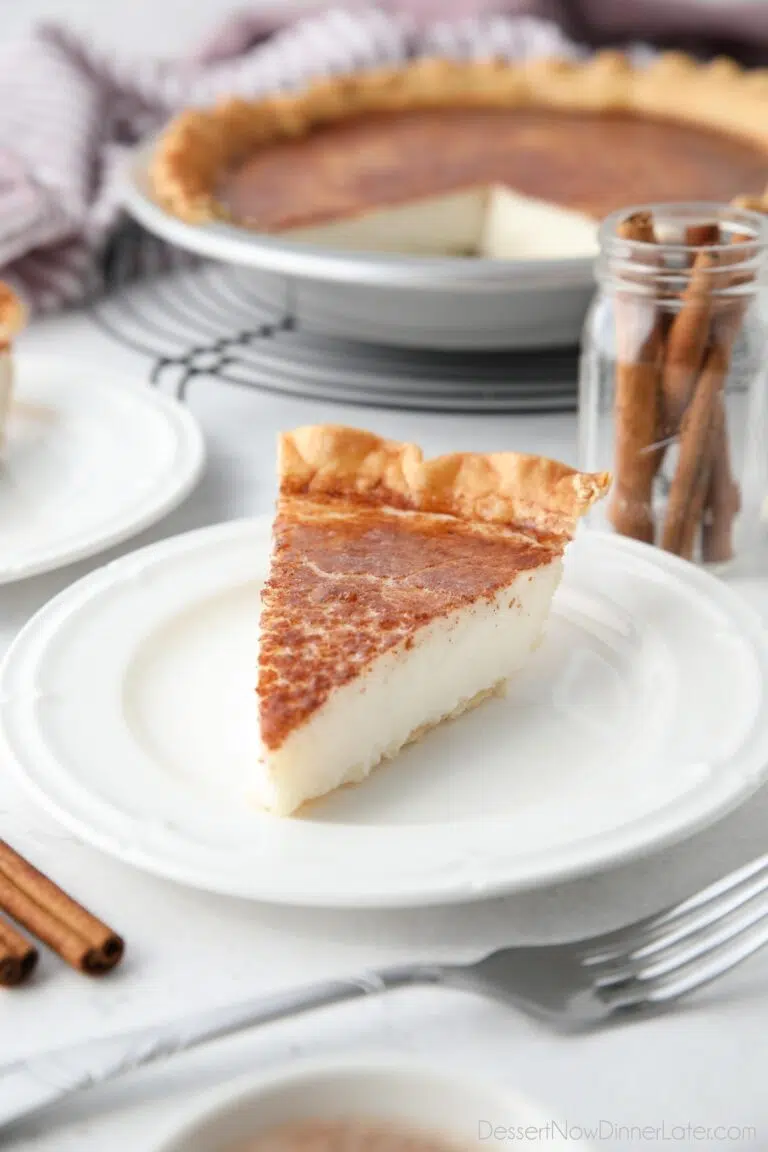 Slice of Sugar Cream Pie on a plate.