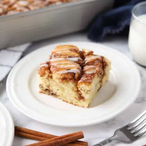 A fluffy vanilla cake filled with cinnamon swirls just like a cinnamon roll.