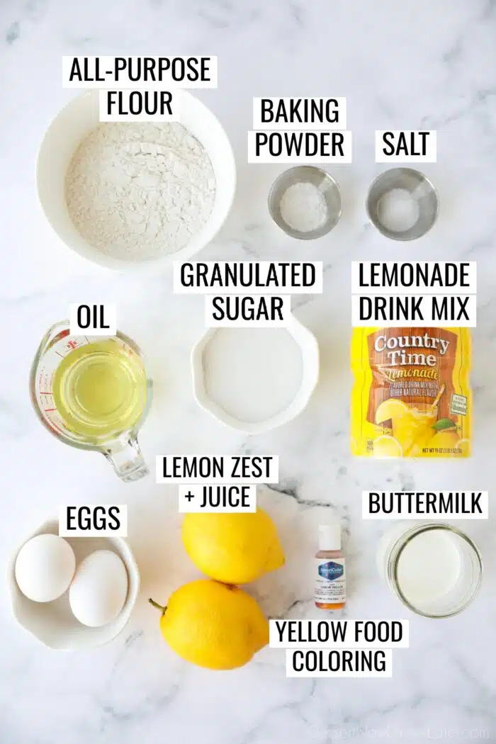 Labeled ingredients needed to make lemonade cupcakes, including lemonade drink mix.