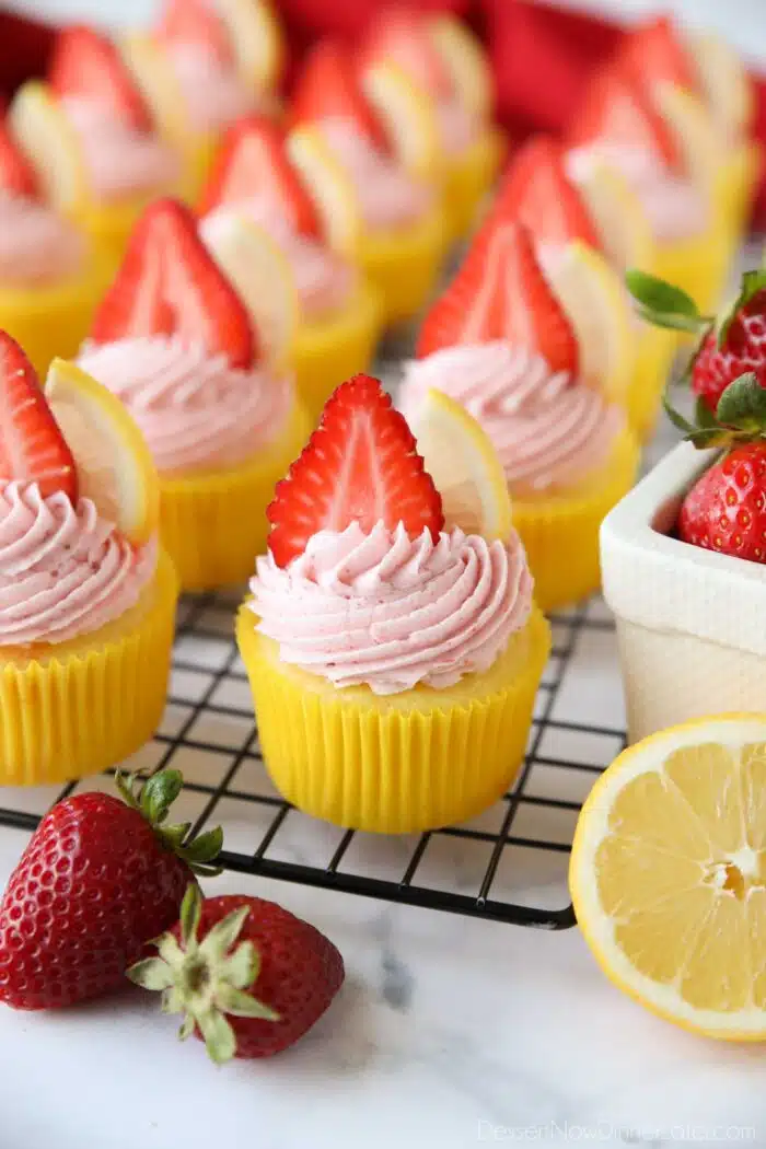 Strawberry Lemonade Cupcakes made from scratch with lemon cake and strawberry frosting.