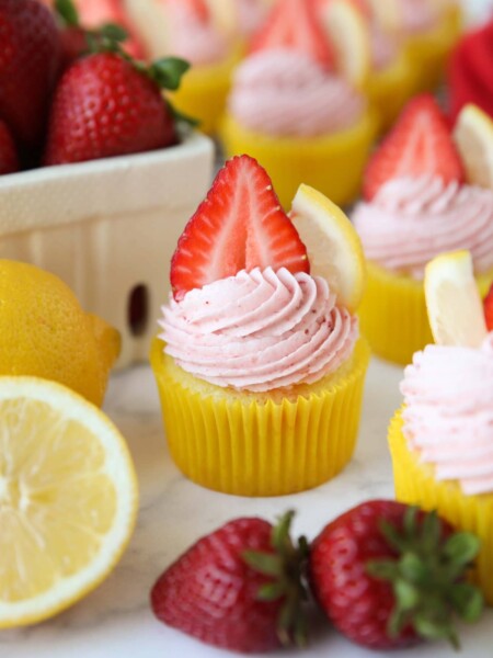 Homemade strawberry lemonade cupcakes with lemonade cake and strawberry frosting.