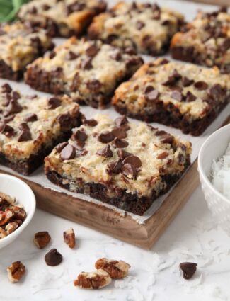 Close up of German Chocolate Bars showing the brownie crust, coconut pecan topping, and chocolate chips.