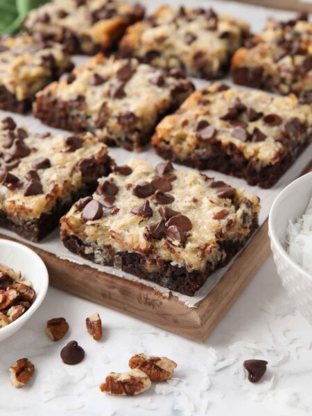 Close up of German Chocolate Bars showing the brownie crust, coconut pecan topping, and chocolate chips.