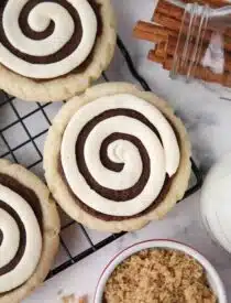 Close-up top view of Cinnamon Roll Cookies on a wire cooling rack.