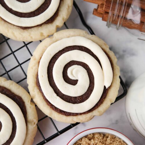 Close-up top view of Cinnamon Roll Cookies on a wire cooling rack.