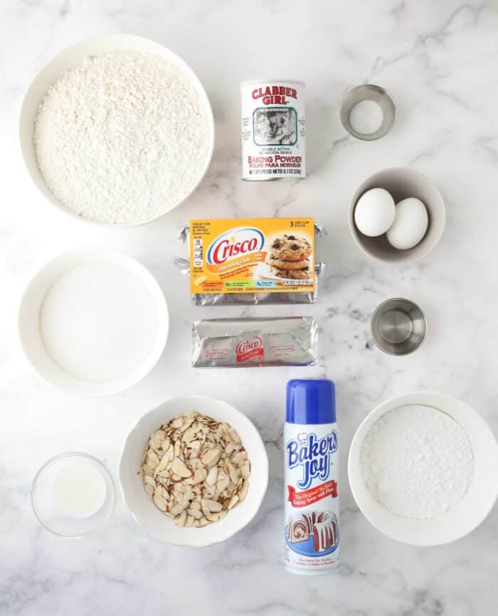 Ingredients needed to make almond bars with Crisco shortening.