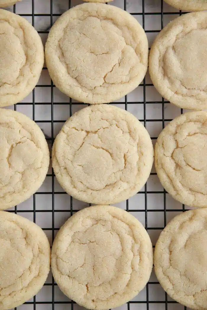 Easy sugar cookies without frosting cooling on a wire rack.